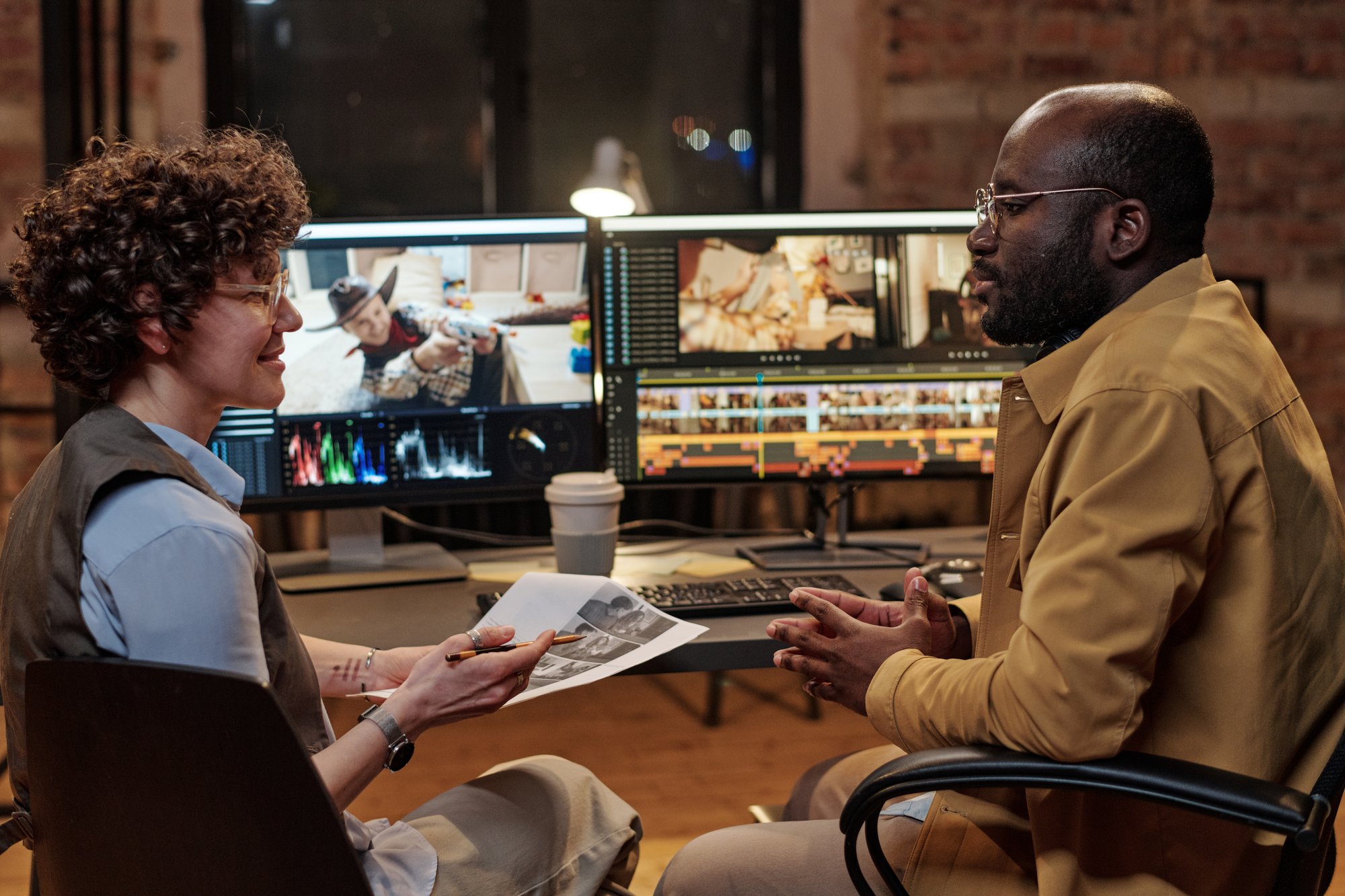 colleagues-discussing-shooting-script-in-team-2025-03-13-15-00-57-utc colleagues-discussing-shooting-script-in-team-2025-03-13-15-00-57-utc